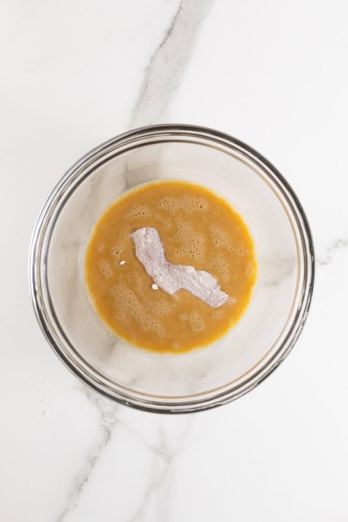 Chicken added to egg mixture after being added to flour