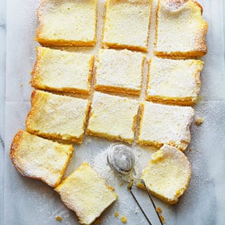 Ooey Gooey Butter Cake Recipe  This authentic gooey butter cake has a perfect chewy blondie texture bottom topped with a custardy cream cheese layer of perfection.  This is the true original St. Louis classic. 