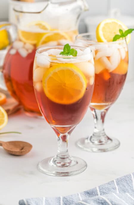 A close up of two glasses of sweet tea