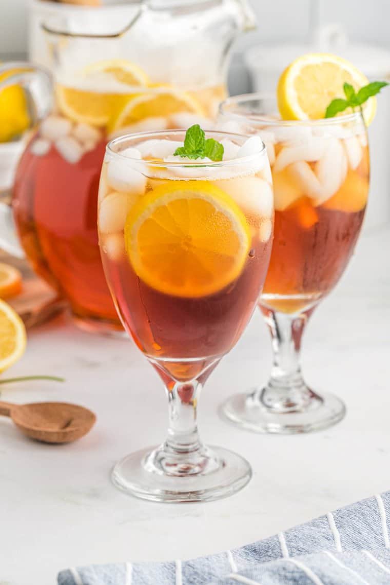 A close up of two glasses of sweet tea 