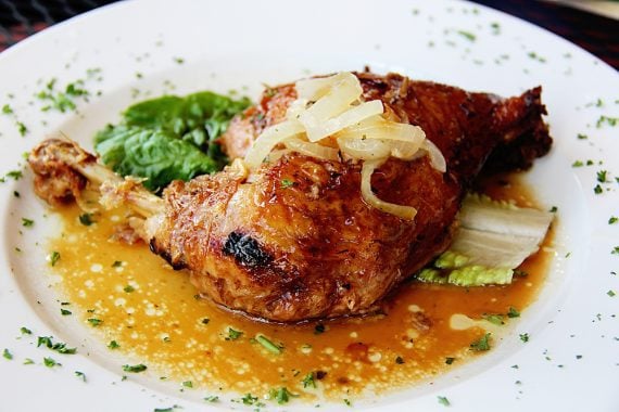 Juicy chicken dish served at El Christo 