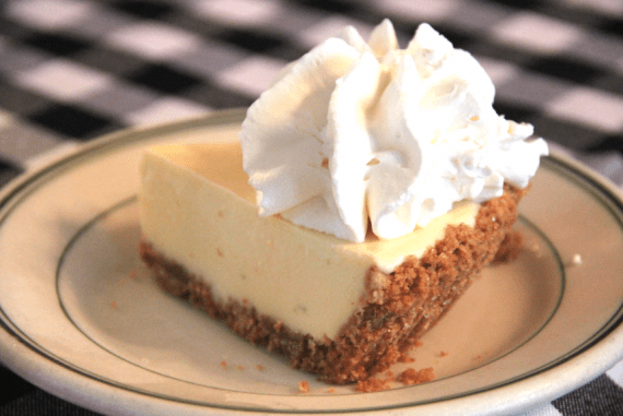 Joe's famous key lime pie served on a white plate and topped with whipped cream at Joe's Stone Crab restaurant