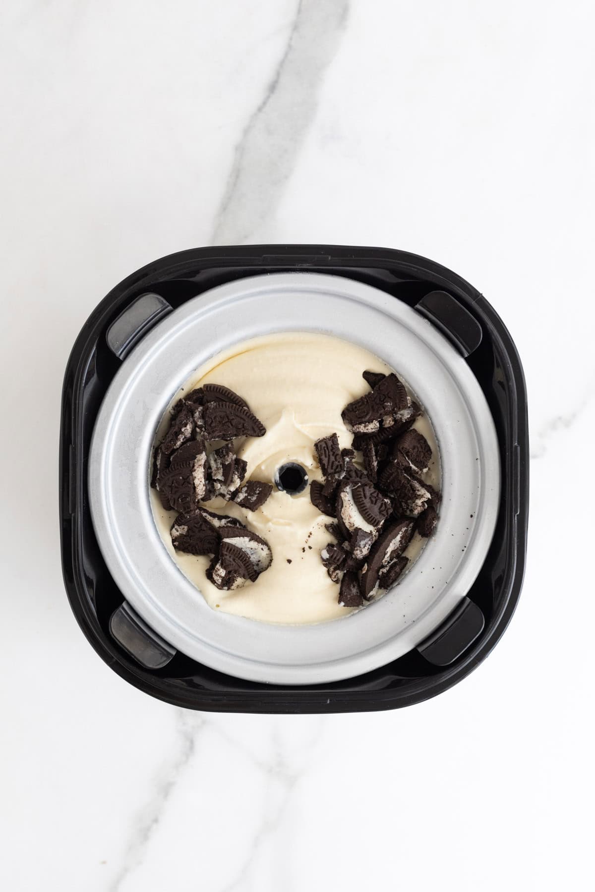 Churned custard with crushed chocolate sandwich cookies added on top