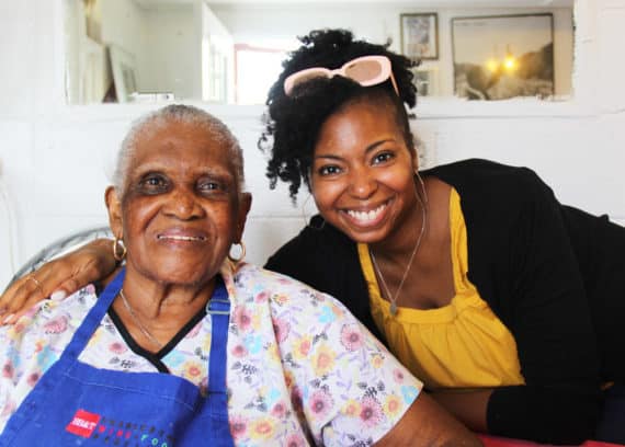 Jocelyn poses for a photo with Martha Lou in her restaurant in Charleston, South Carolina