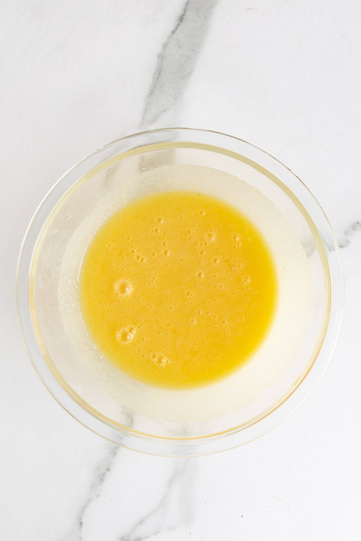 Egg and sugar mixture fully whisked until smooth and slightly frothy