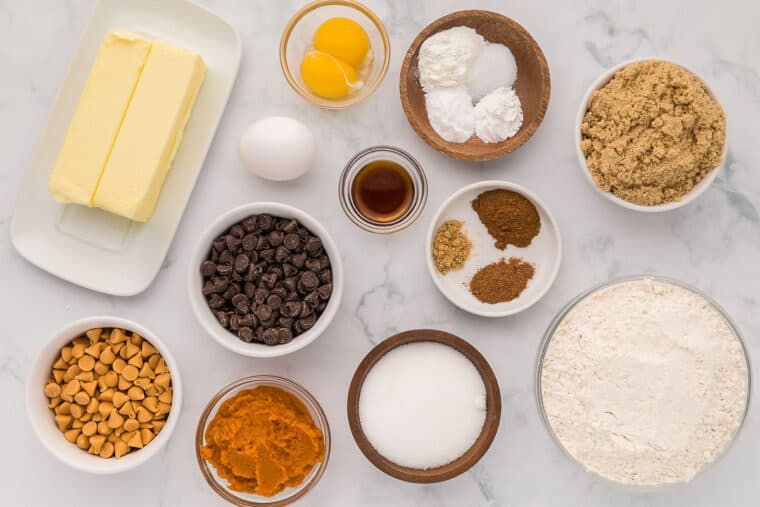 Ingredients to make pumpkin chocolate chip cookies on the table before mixing up.