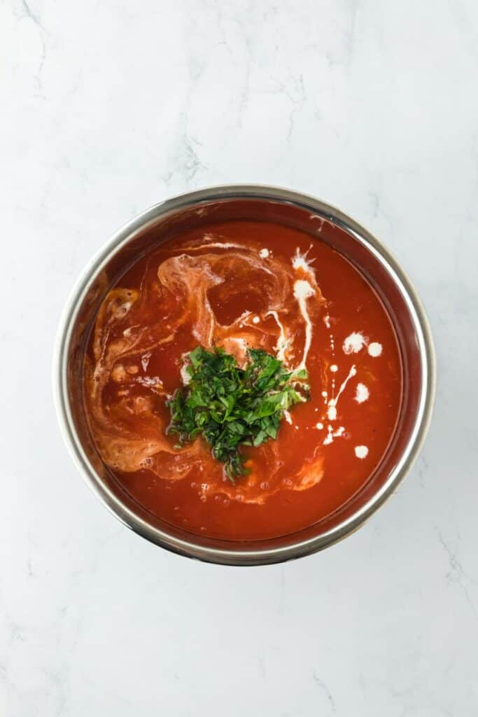 Sherry, heavy cream and basil added to a tomato basil soup base in an instant pot