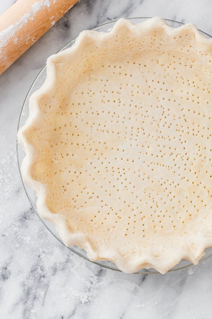 Pie crust pricked on bottom before baking