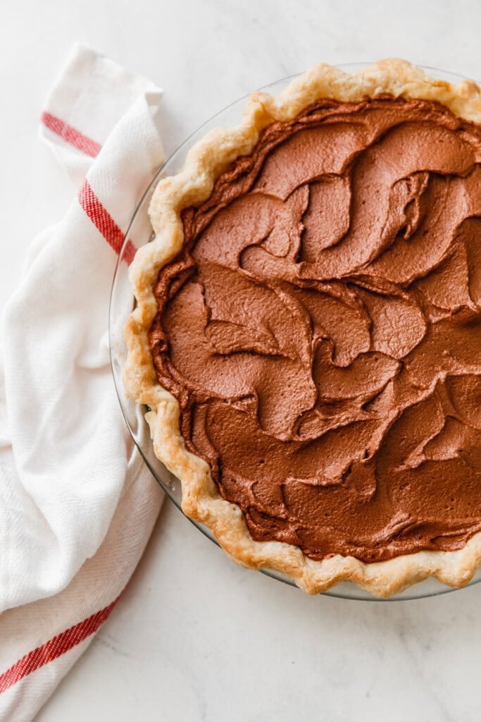 Chocolate filling added to pie crust