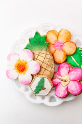 Homemade cookies in the shape of flowers and pineapples for Harmony's first birthday party