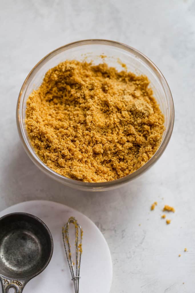 Graham cracker crust recipe ingredients in a bowl combined