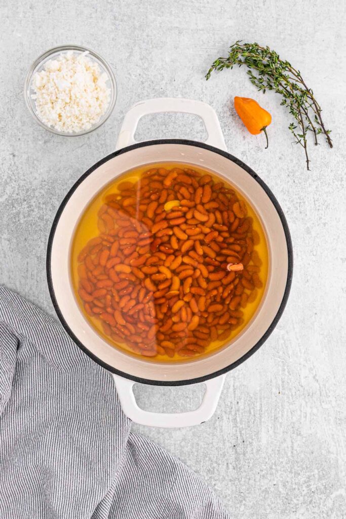 Cooking the beans for rice and peas.