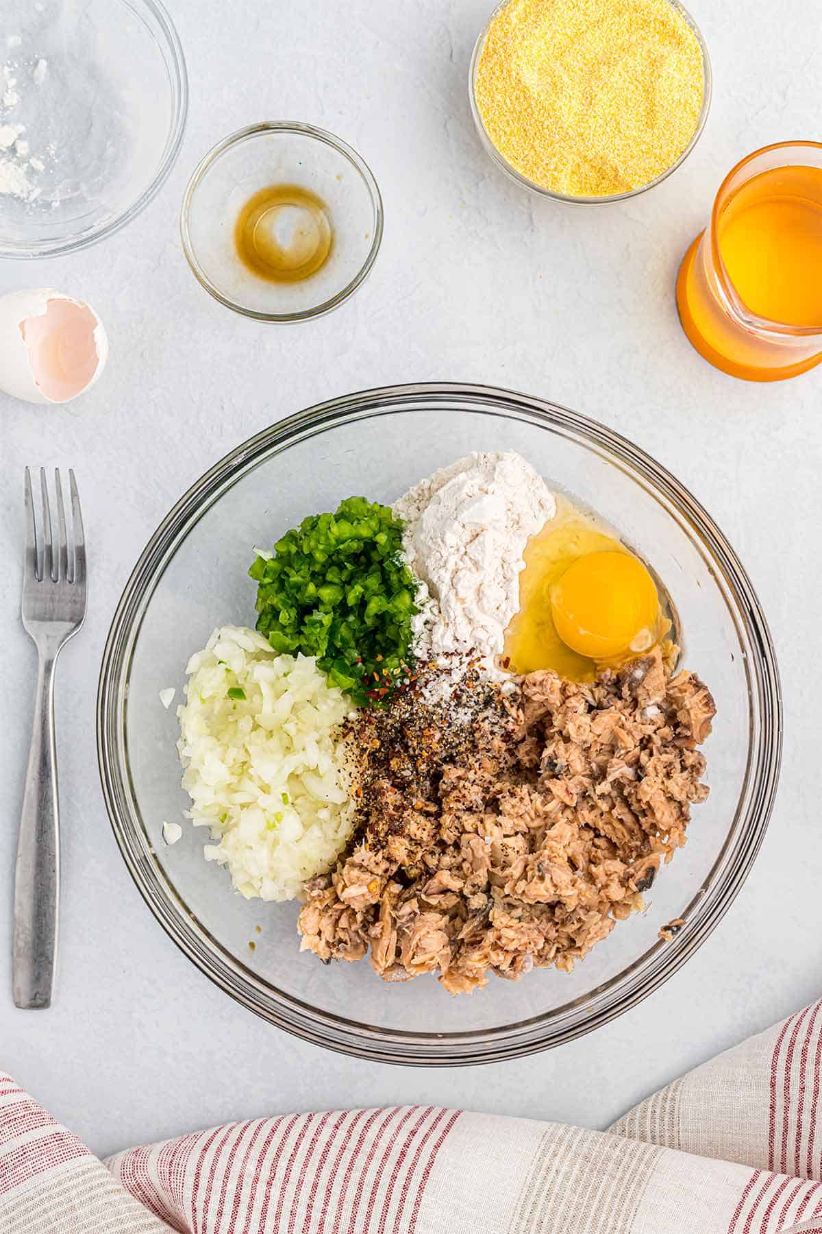 Ingredients in a bowl to make easy salmon croquettes.