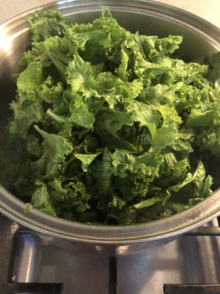 Mustard Greens cooking in pot e1566700735469 312x416 - The BEST Authentic Southern Mustard Greens Recipe with Smoked Turkey