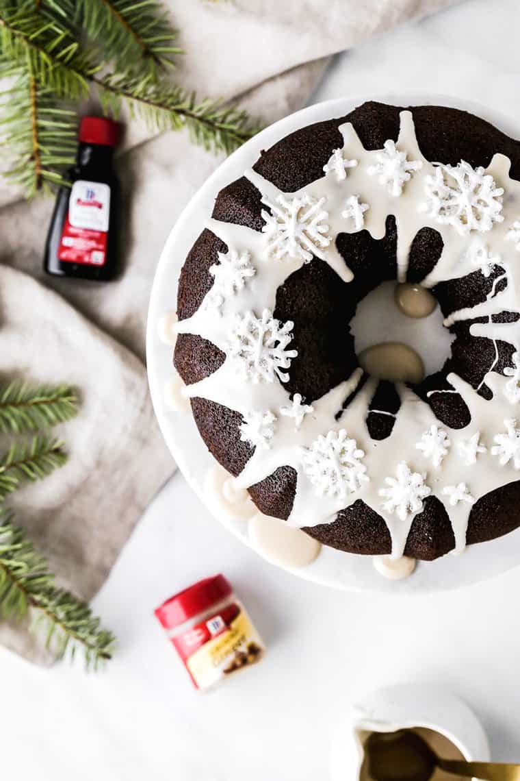 A overview of a gingerbread cake recipe against white background with baking extracts