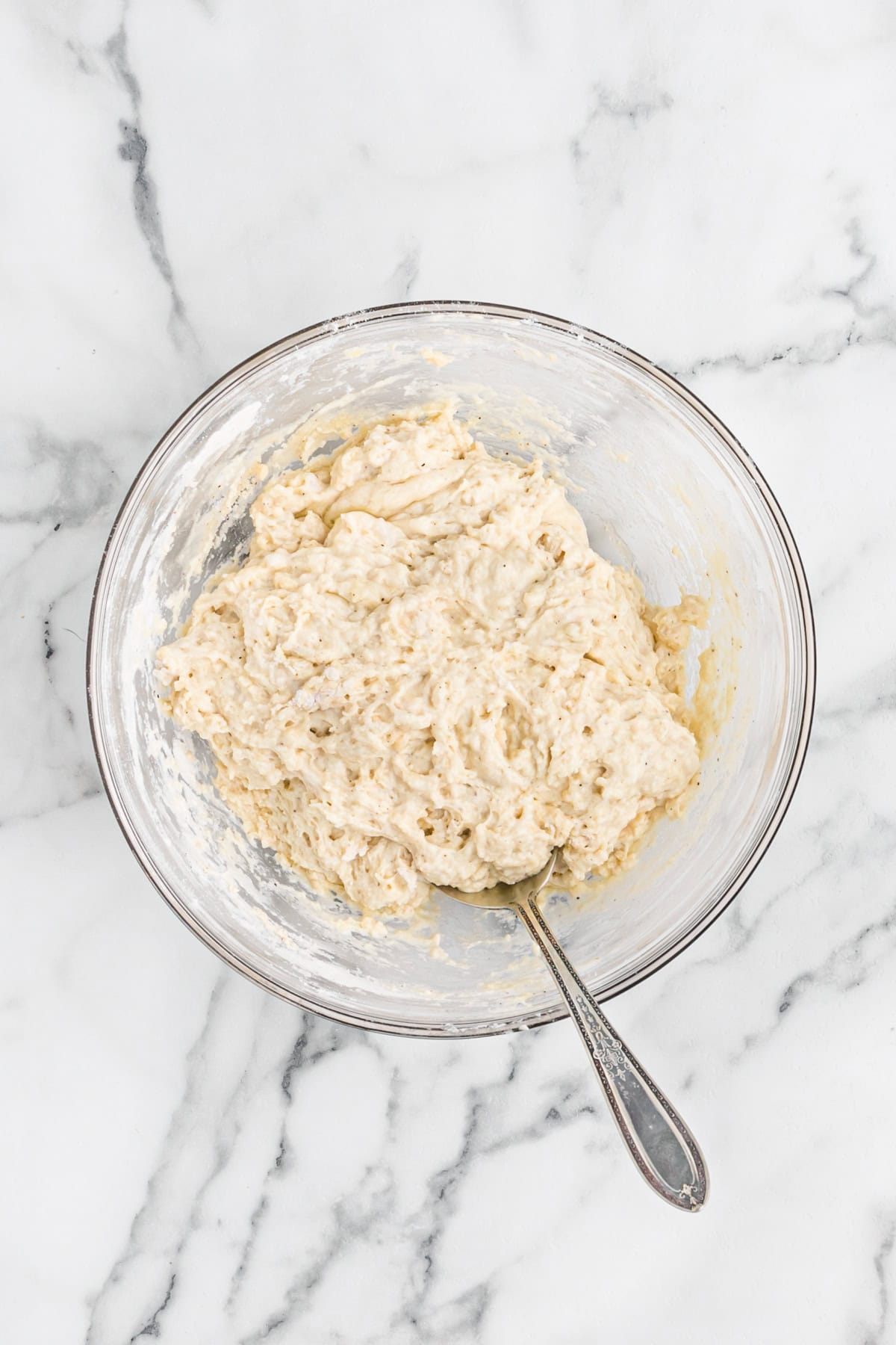 Dumpling dough in a glass bowl to make easy chicken and dumpling recipe