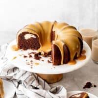 Beautiful chocolate bundt cake with white chocolate ganache glaze