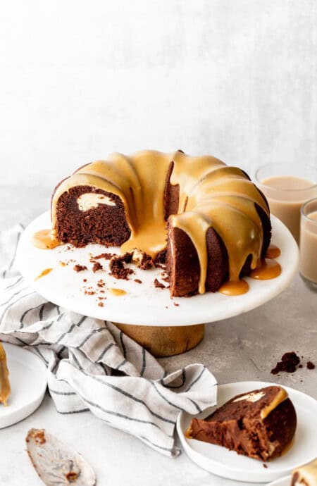Beautiful chocolate bundt cake with white chocolate ganache glaze