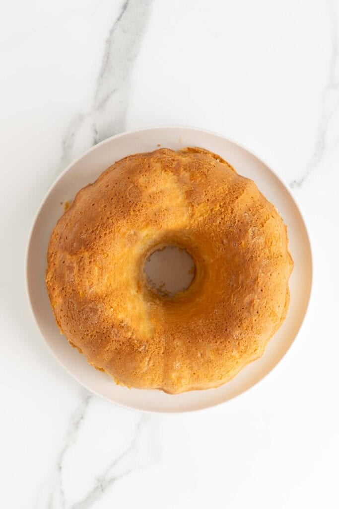 Baked butter pound cake recipe on a white plate