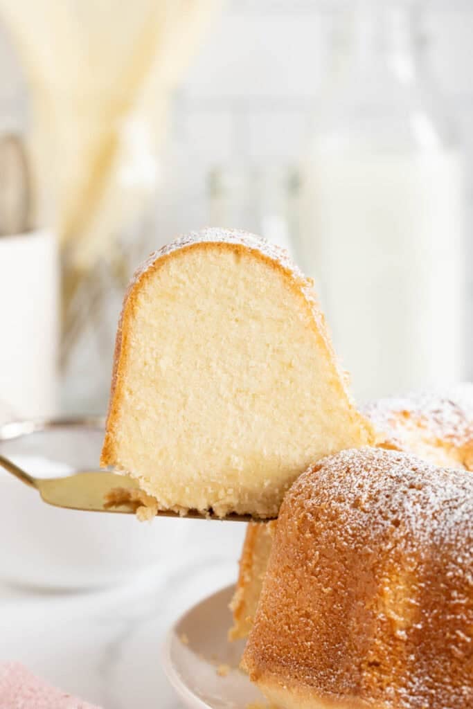 A slice of butter pound cake on a server