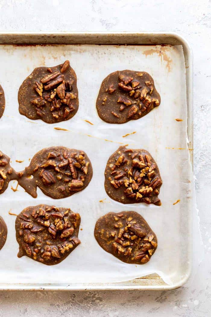 An overhead of pralines on baking sheet cooling
