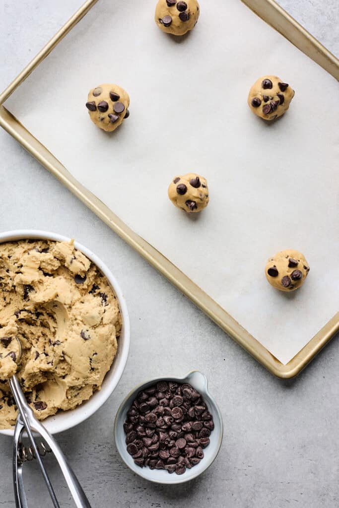 Scooped dough on parchment paper before baking