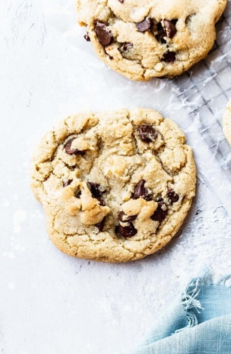 A chewy gluten free chocolate chip cookie ready to serve
