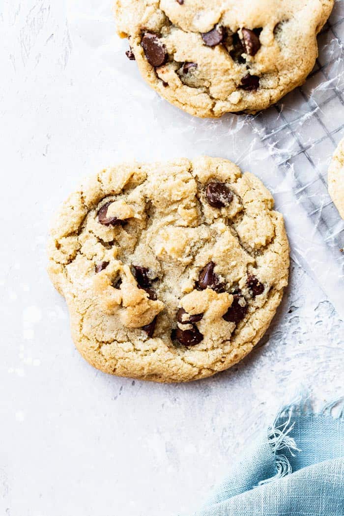 A chewy gluten free chocolate chip cookie ready to serve