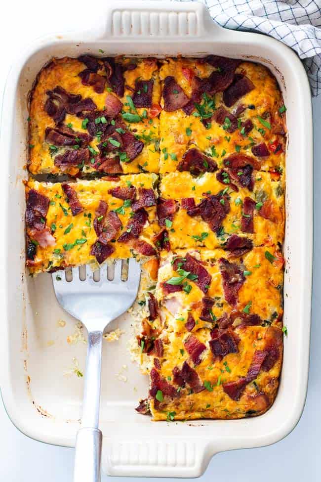 Slices of breakfast casserole ready to serve for a brunch party