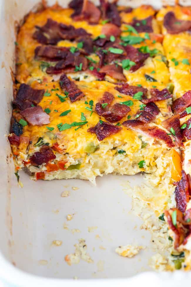 A close up of super easy breakfast casserole with cheese and filling showing