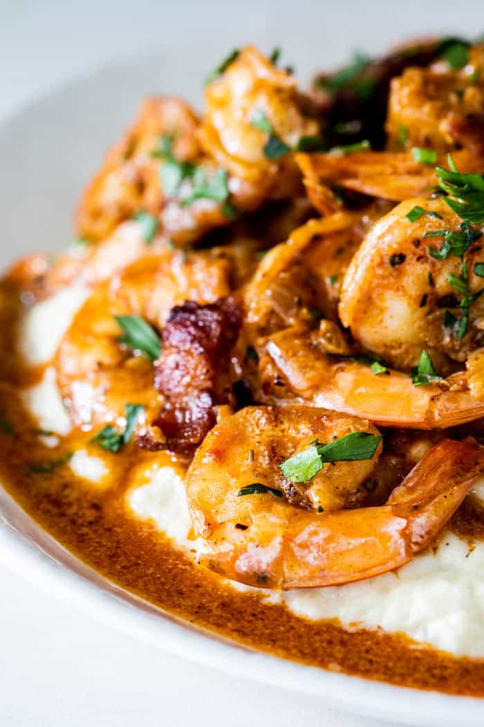 A close up of low carb shrimp in a cajun sauce served over cauliflower grits