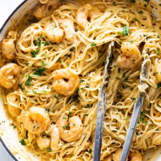 A large pot of cajun shrimp scampi with linguine pasta ready to serve