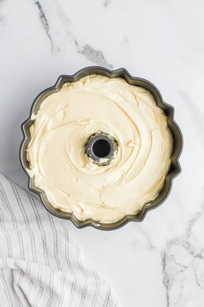 Key lime cake batter in bundt pan before baking