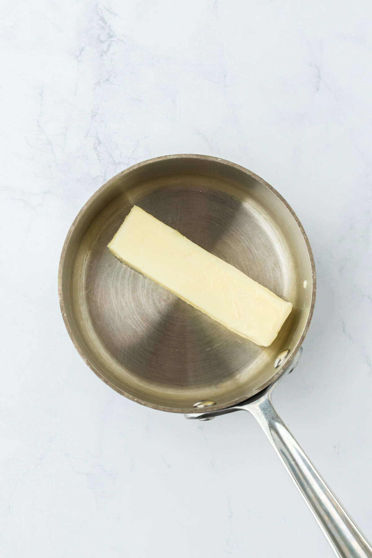 Butter added to a saucepan to brown