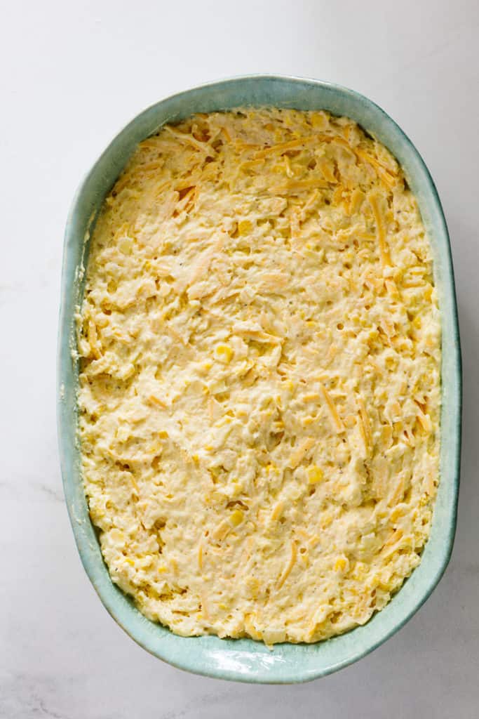 Corn spoon bread ingredients mixed and spread into a casserole dish