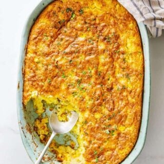 Baked corn spoonbread being served during a meal