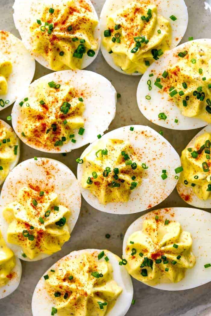 A close up of Divine eggs sprinkled with paprika ready to serve