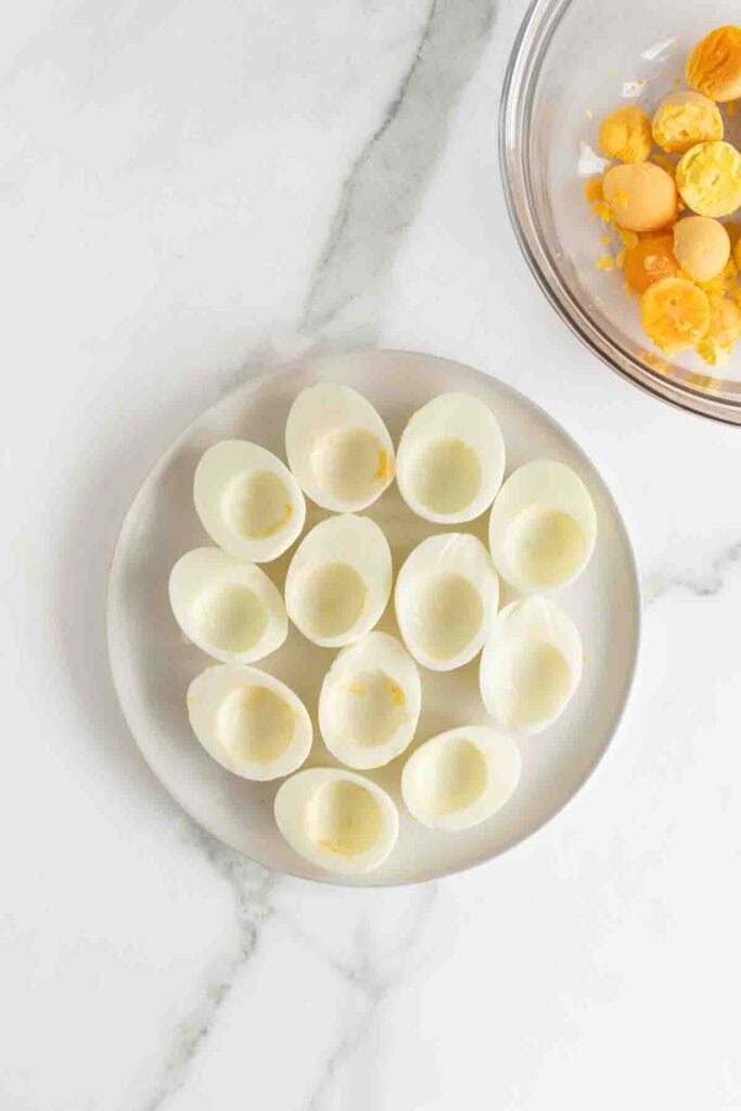 Egg yolks removed from centers of eggs.