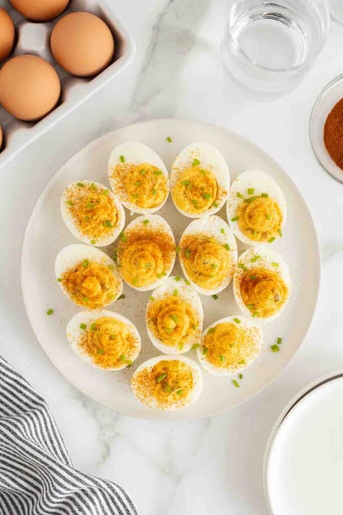 Deviled eggs with paprika sprinkled on top