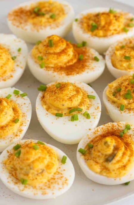 Southern deviled eggs on a white plate close up