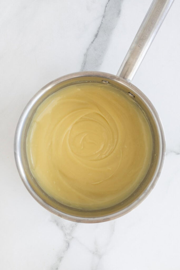 Thickened vanilla pudding in a pot