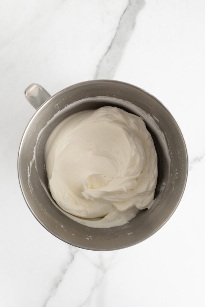 Completed whipped cream in a mixing bowl