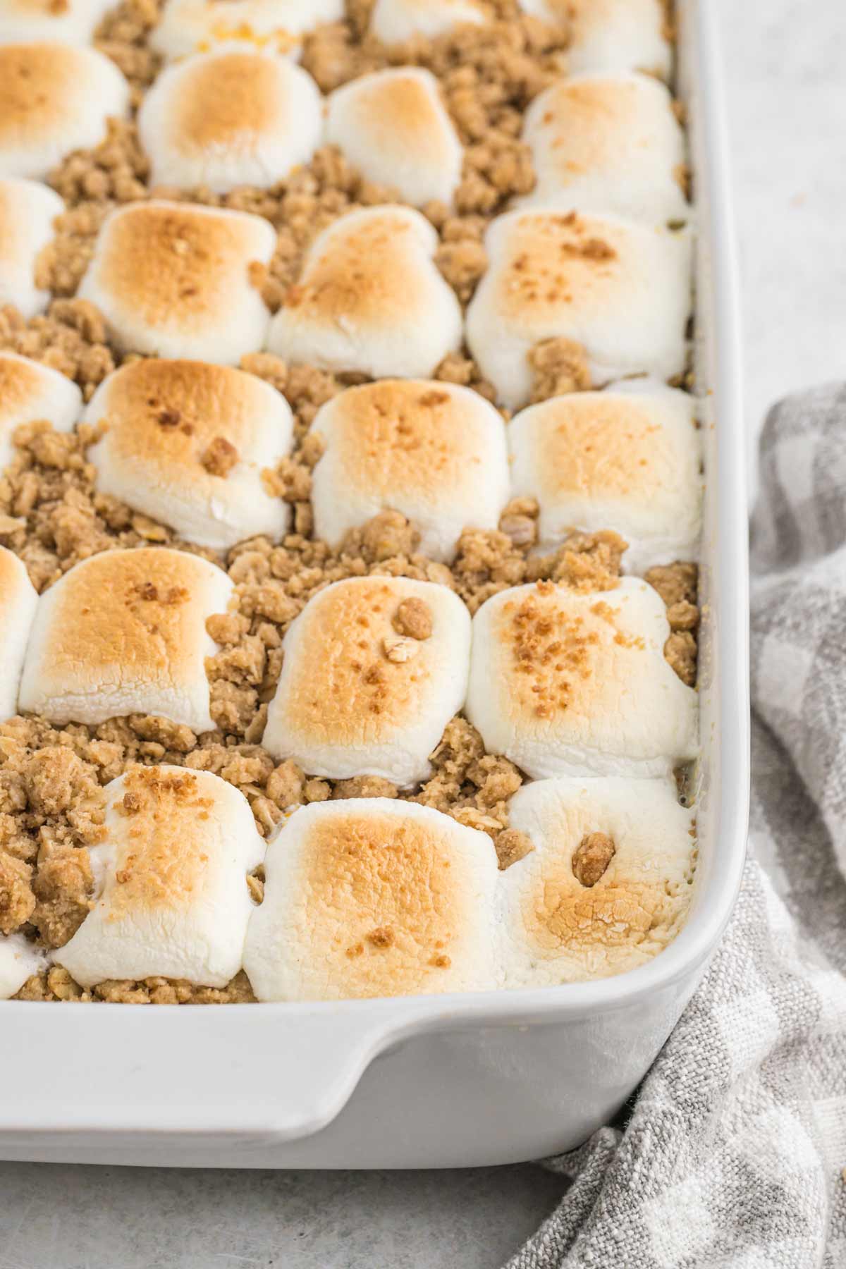 Sweet potato casserole topped with toasted marshmallows fresh out of the oven.