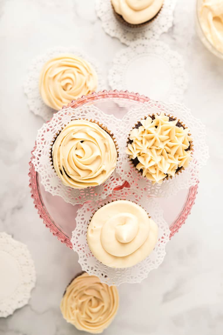 Cupcakes with caramel frosting piped with different piping tips