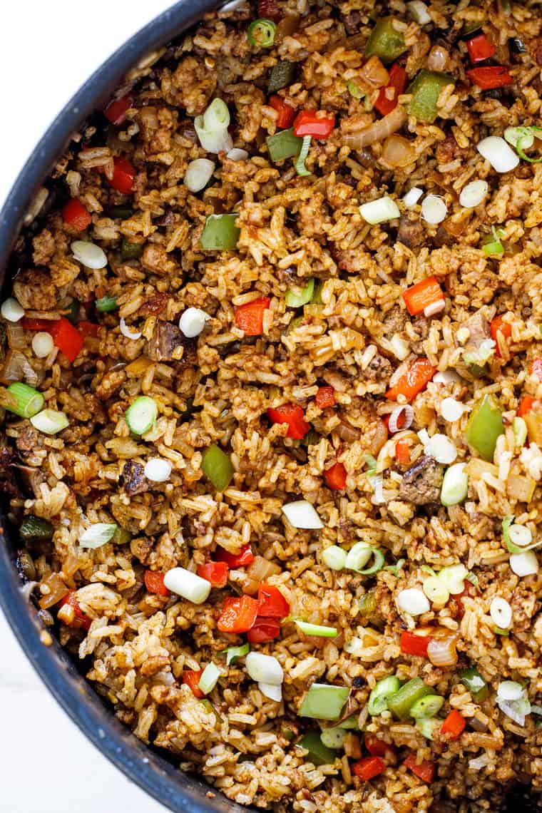 A close up of cajun rice in a large pot just cooked