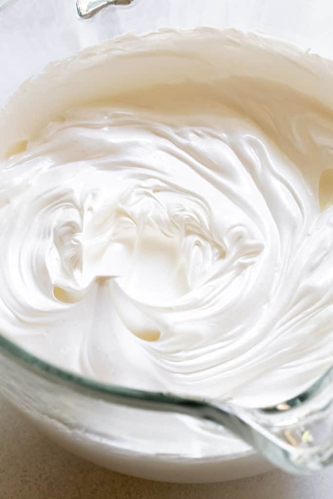 Meringue whipped before adding butter to create swiss meringue buttercream