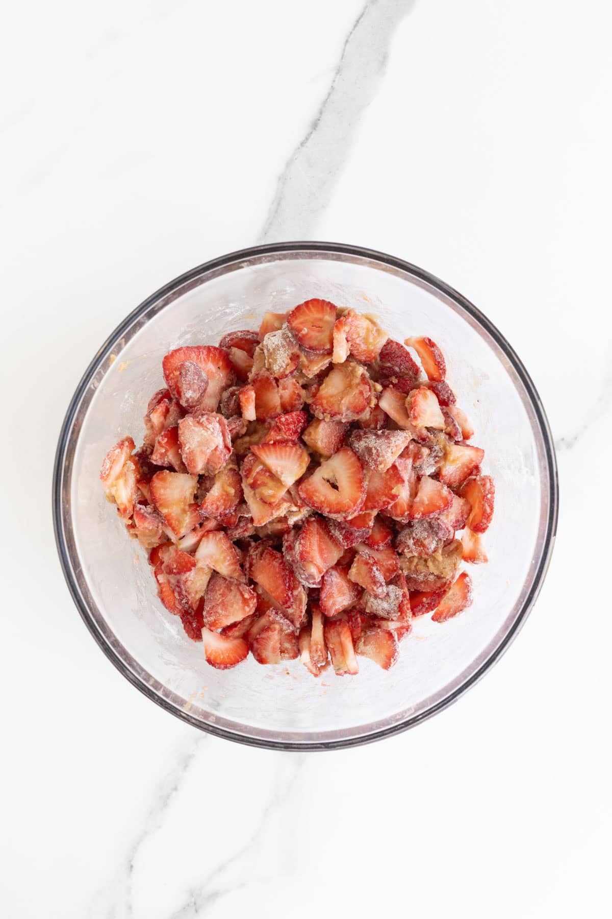 Strawberries mixed with the sugar and flour blend