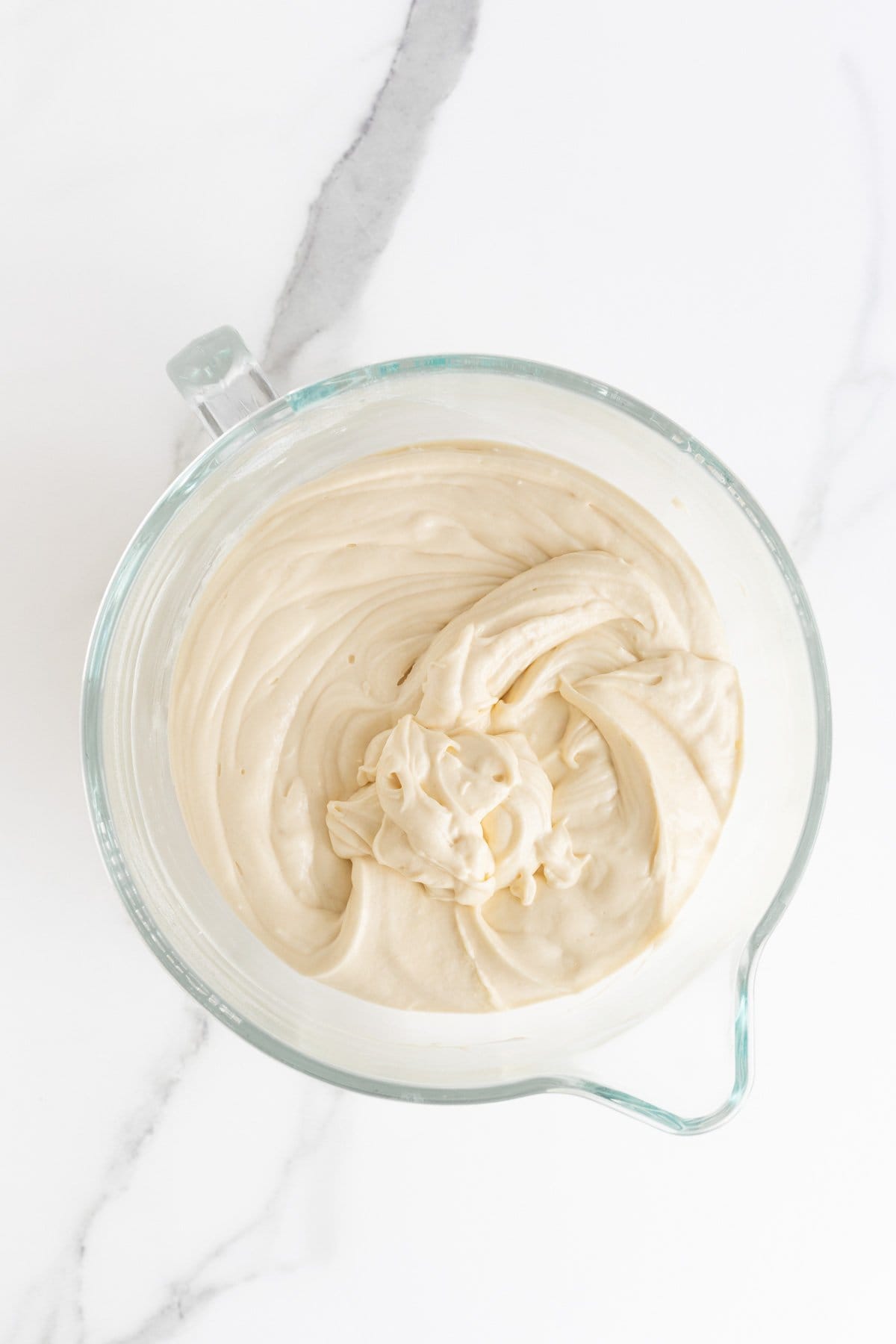 Finished strawberry shortcake cake batter in stand mixer bowl