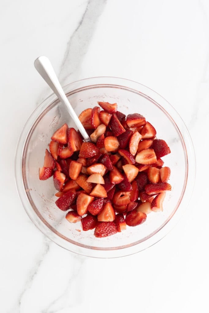 Finished mascerated strawberries in a bowl