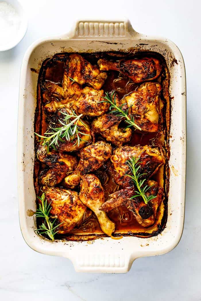 Southern baked chicken with fresh rosemary fresh out of the oven ready to serve